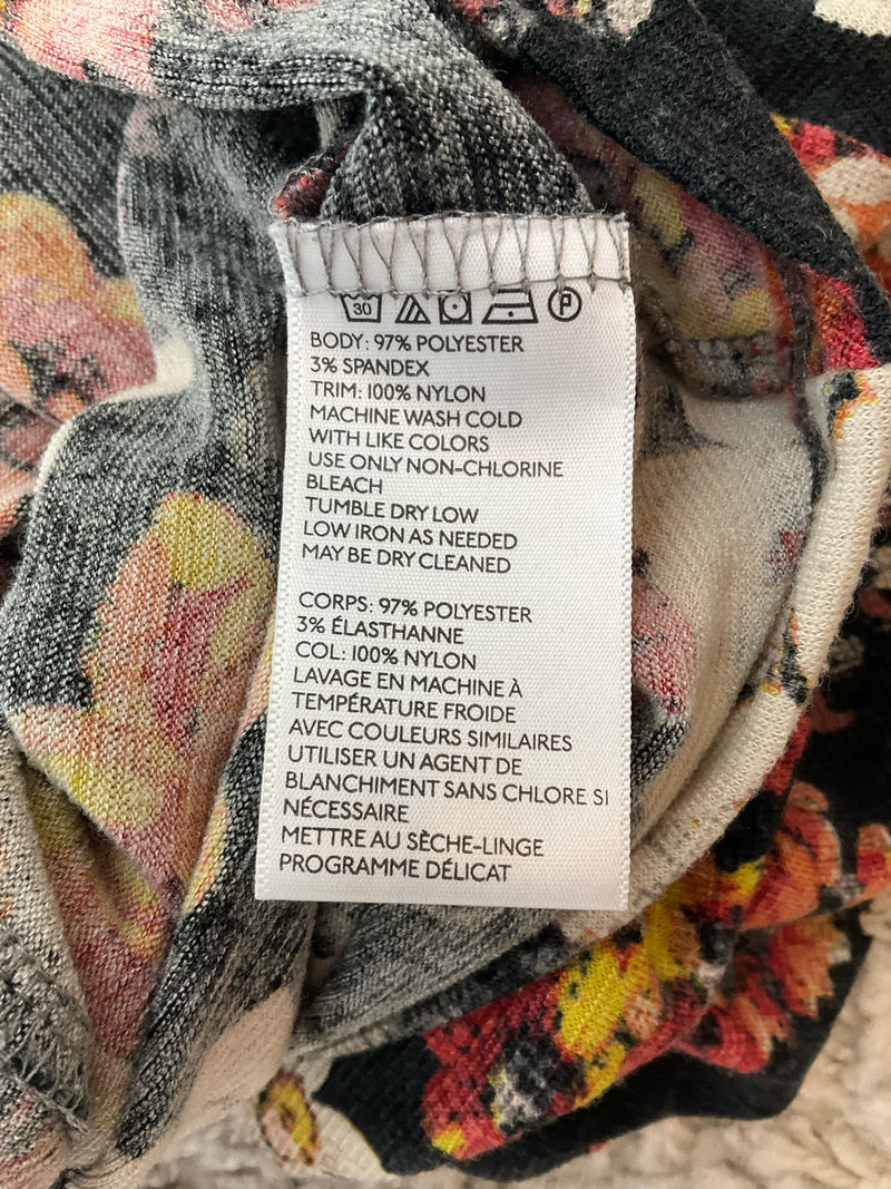 Fabric care label of Kimchi Blue Black/Cream/Red Floral Pre-Owned Ladies Dress - Size Large, made of 97% polyester and 3% spandex.