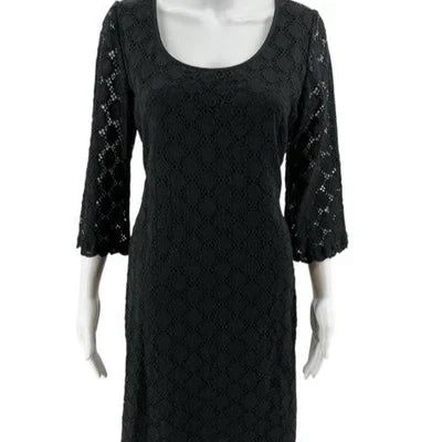 Ronni Nicole black eyelet ladies dress, size 12, showcasing intricate eyelet detailing and a classic silhouette.