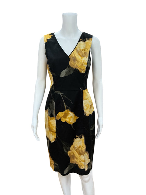 Front view of WHBM Black & Yellow Floral V-Neck Sheath Dress, size 8, featuring sleeveless design and fitted silhouette for office or evening wear.