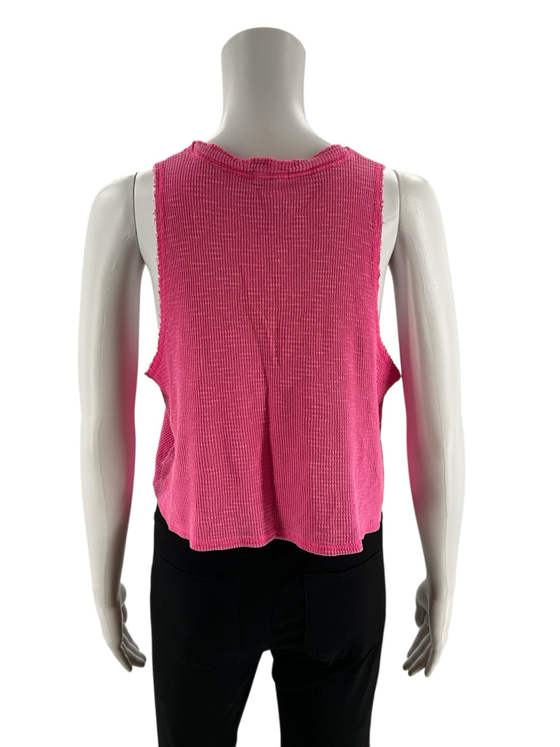 Back view of Aerie Pink Pre-Owned Ladies Top - Size Small, highlighting waffle knit texture and raw hemline in vibrant pink.
