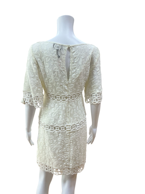 Back view of Laundry Cream Lace Pre-Owned Ladies Dress - Size 4 featuring keyhole closure and detailed crochet lace trim.