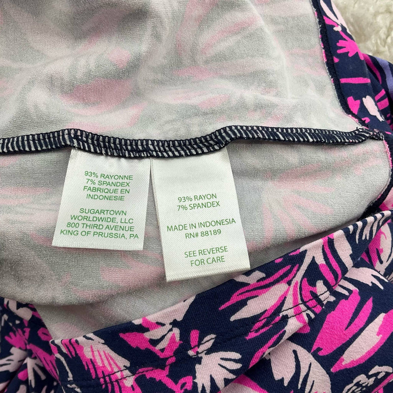 Fabric care tags of Lilly Pulitzer Dress Size XL indicating rayon-spandex blend and origin, listed at Margaret’s Fine Consignments.