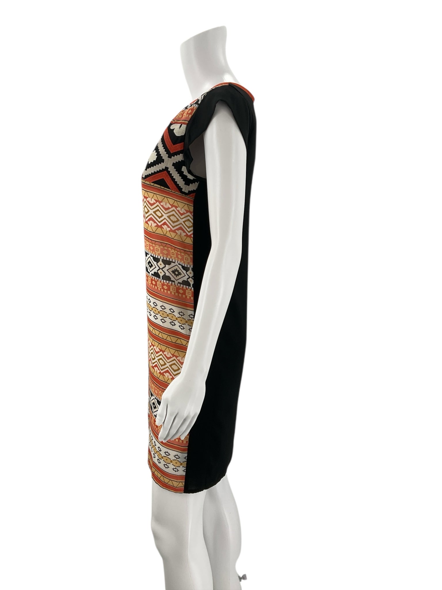 Side profile of THML Coral/Multi Aztec Dress Size XS showing contrast between patterned front and solid black back.