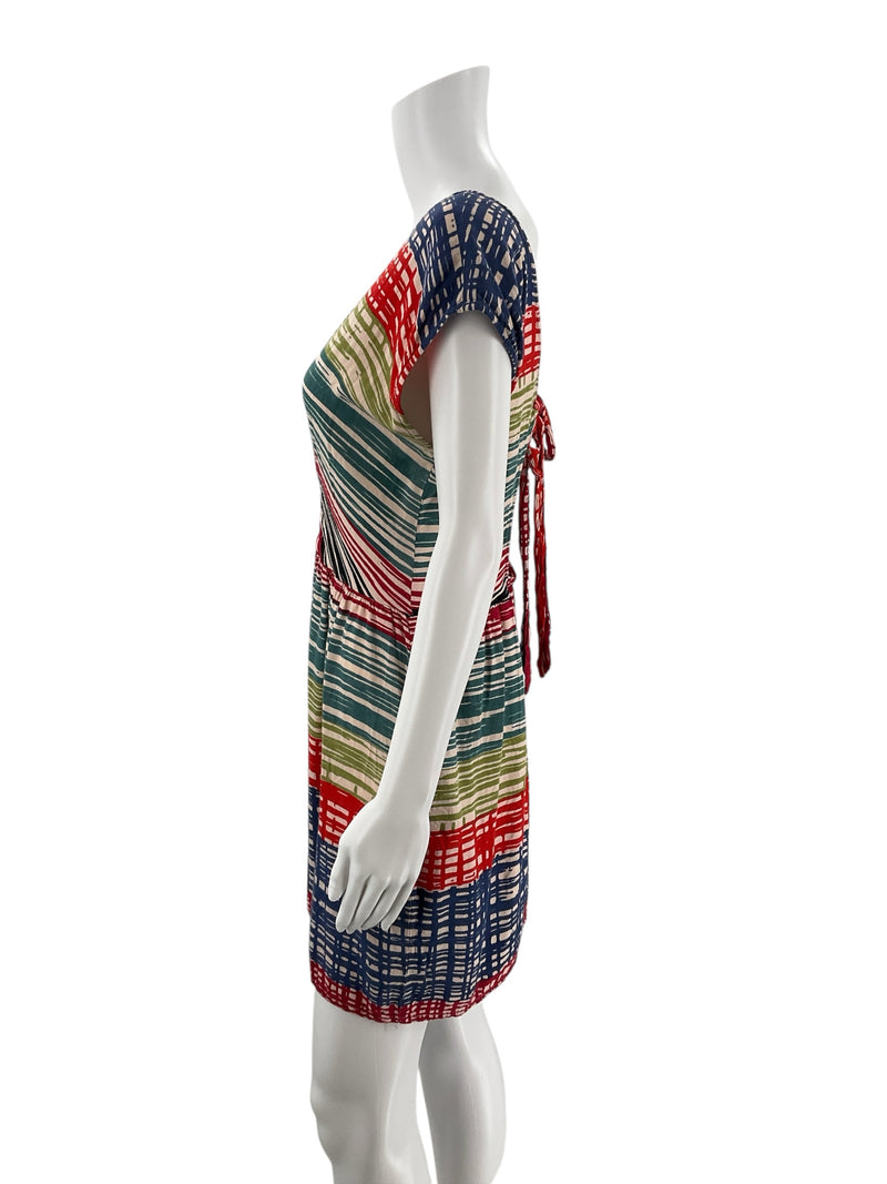 Side profile of Angie Tan/Multi Print Pre-Owned Ladies Dress - Size Large highlighting cap sleeves and flared mini skirt in multicolor stripes.