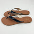 New York & Co Navy Pre-Owned Ladies Sandals - Size 8 with patent T-strap design, gold medallion accent, and cushioned tan footbed for summer wear.