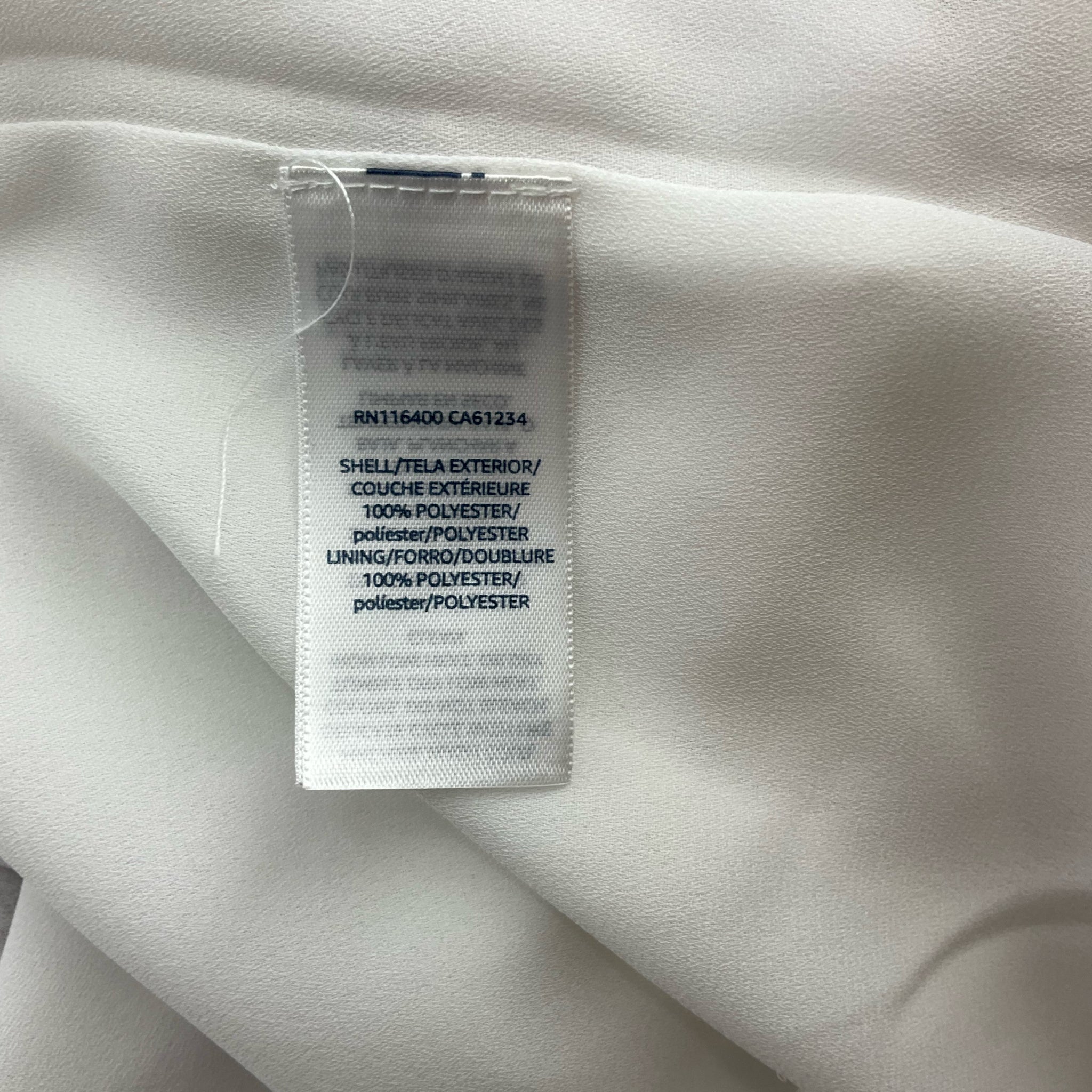 Fabric content tag showing 100% polyester shell and lining on Ella Moon Mauve/White Floral Maxi Dress - Size Large. Lightweight and breathable.