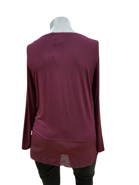 Back view of Lysse maroon solid top, size XL, featuring a sheer panel at the hem. Ideal for stylish, comfortable everyday outfits.
