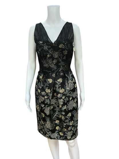 Pre-owned Kay Unger black and gold floral sheath dress on mannequin, showcasing intricate brocade pattern and formal cocktail style.