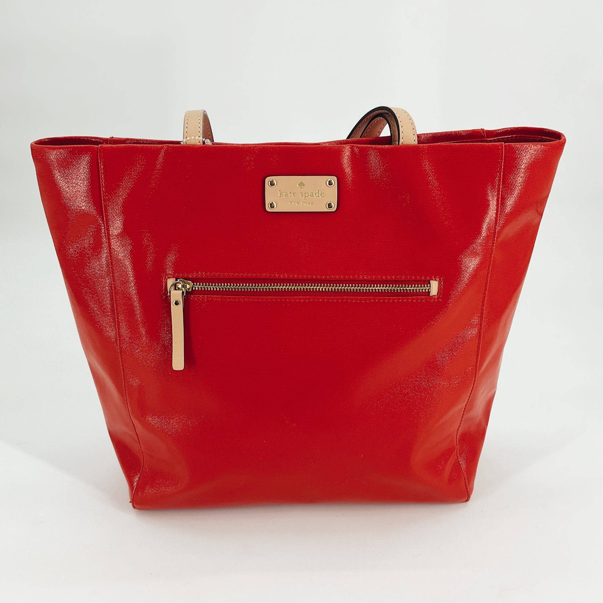 Kate Spade Red/Tan Solid Pre-Owned Tote Bag with front zipper pocket and gold logo plate, available at Margaret's Fine Consignments.