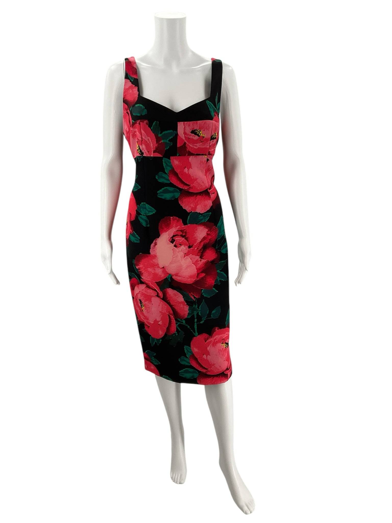 Front view of Trina Turk Scoop Neck Knee Dress Size 10 in black with vibrant pink and green floral design, available at Margaret’s Fine Consignments.