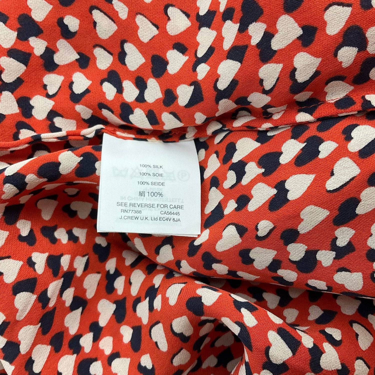 J Crew Orange/Navy/Cream Hearts Pre-Owned Ladies Top - Size 8 Petite - Margaret’s Fine Consignment