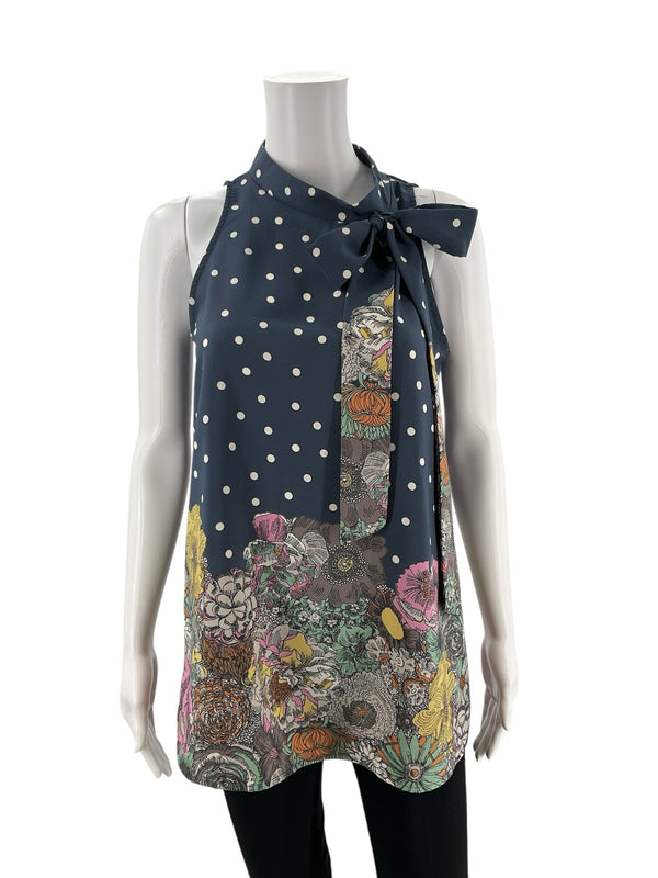 Pre-owned Les Amis navy polka dot sleeveless top with floral hem and bow tie-neck, displayed on mannequin, size small bohemian blouse.