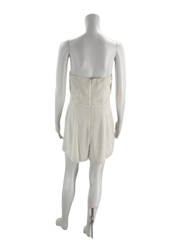 Back view of Leith Romper Size Medium in white, featuring a zip closure and tailored fit. Shop timeless pre-loved fashion at Margaret’s Fine Consignments.