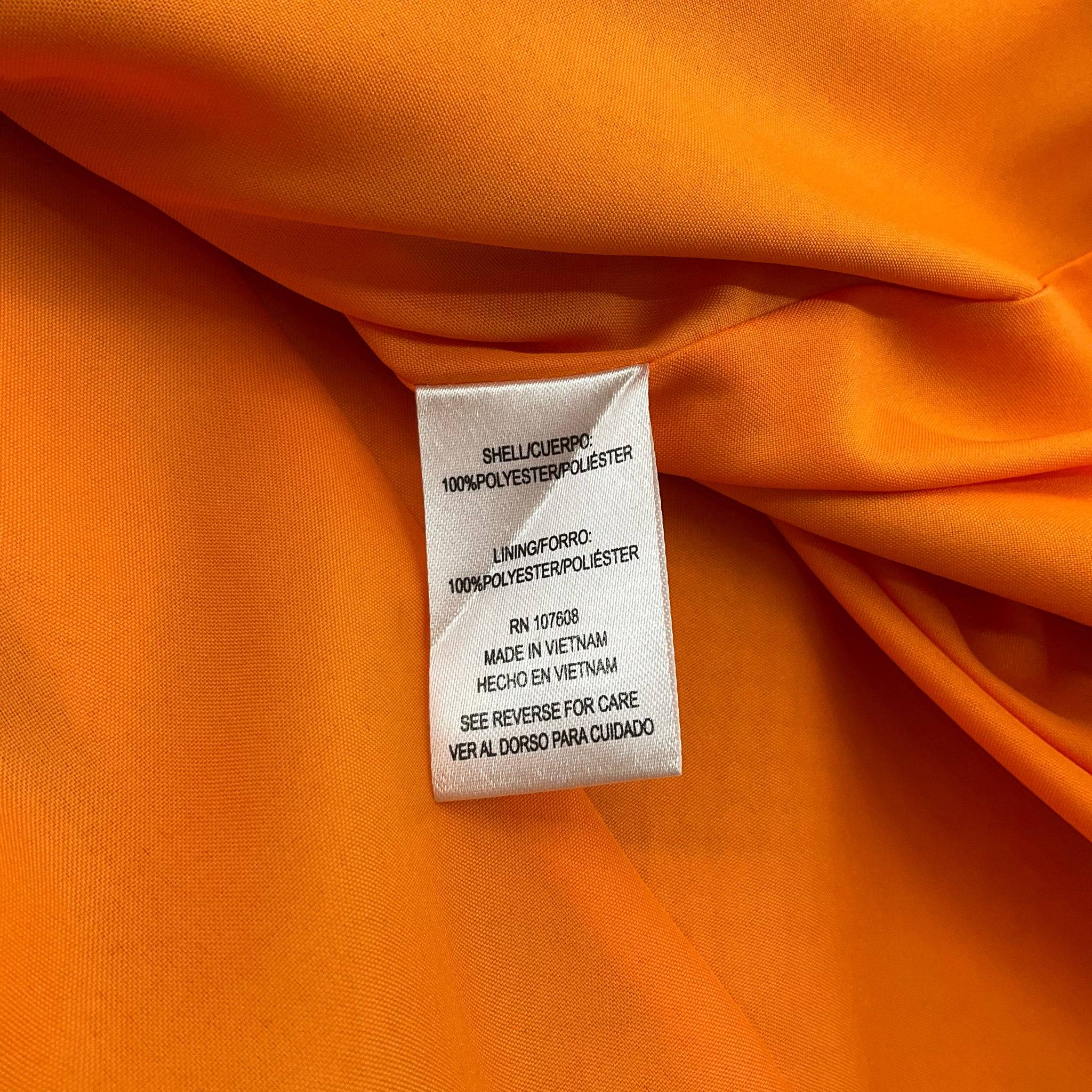 Fabric content tag of Nicole Miller Black & Multi Floral Dress – Size 6, indicating 100% polyester shell and lining, made in Vietnam.