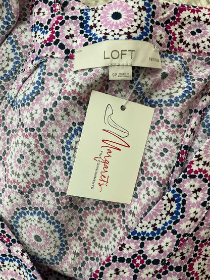 Pre-owned Loft lilac and multi print peplum top with flutter sleeves and V-neck in size small petite.