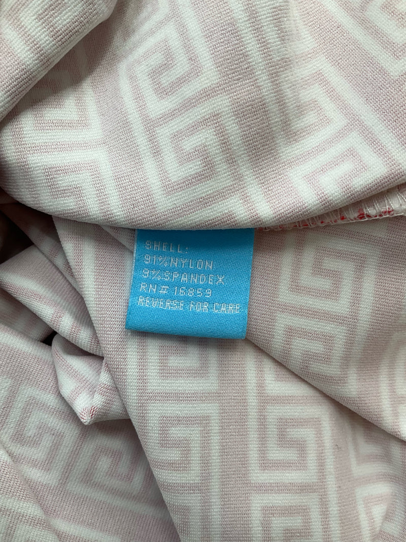 Fabric content tag showing 91% nylon and 9% spandex blend of J. McLaughlin coral Greek Key Catalina Cloth top. Size small, stretchy and soft.