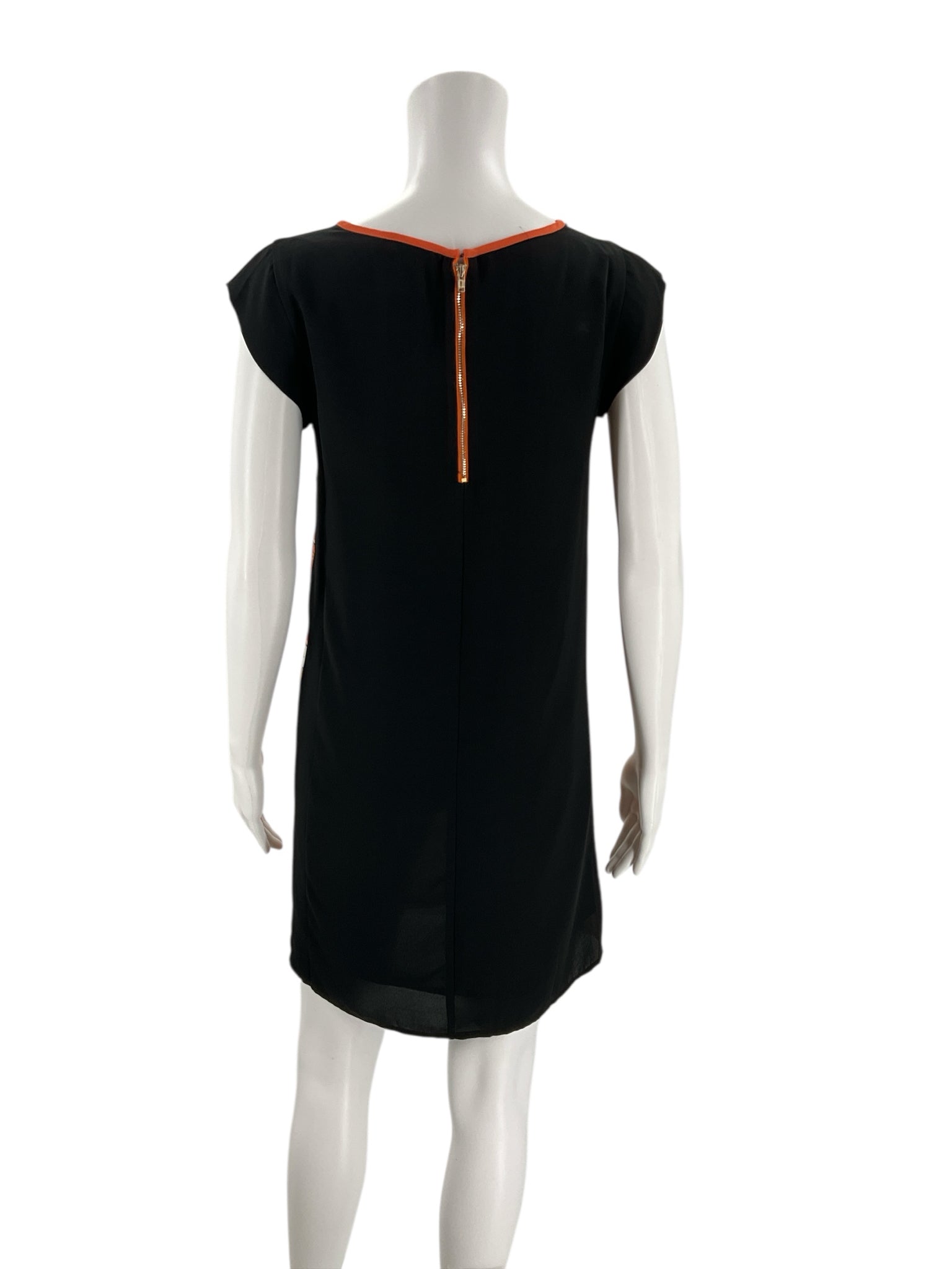 Back view of THML Coral/Multi Aztec Dress Size XS featuring solid black fabric and orange zipper detail for easy wear.