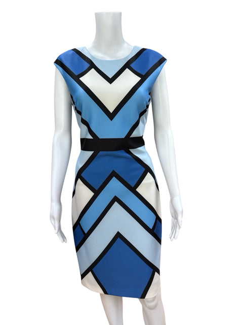 Front view of Vince Camuto size 6 pre-owned color block pencil dress with bold blue, white, and black chevron design, ideal for office or cocktail wear.